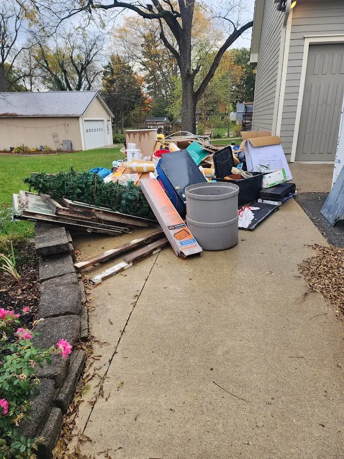 Dumpster being loaded with debris for 30 Yard Dumpster Rental in Pocomoke City